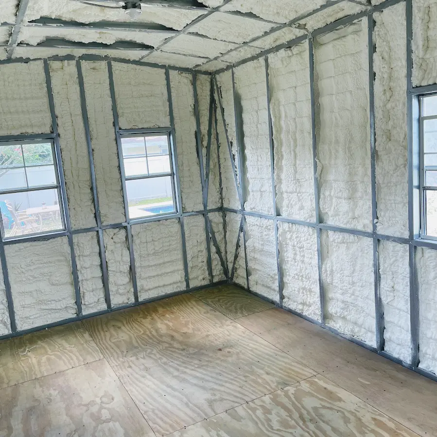 Closed-cell spray foam insulation applied to wall cavities in a residential project in Watervliet